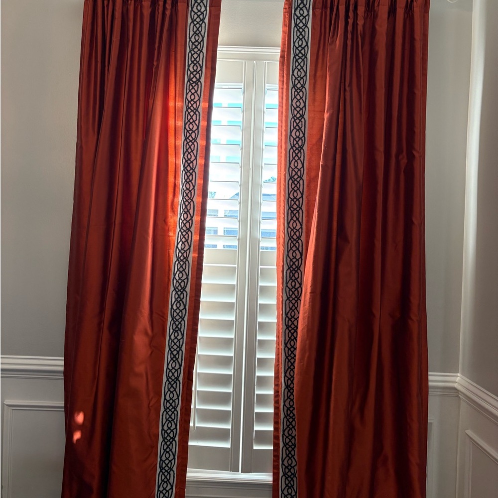 Elegant Rust Curtains with Decorative Trim